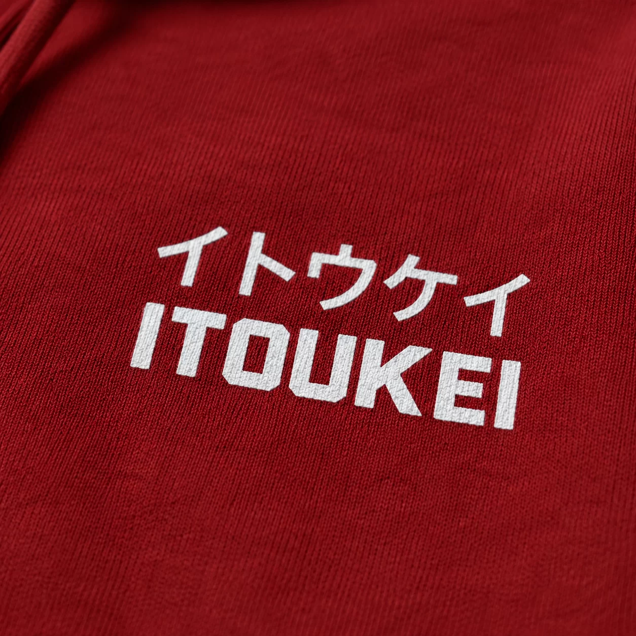 Hoodie ITOUKEI rouge — détail logo poitrine